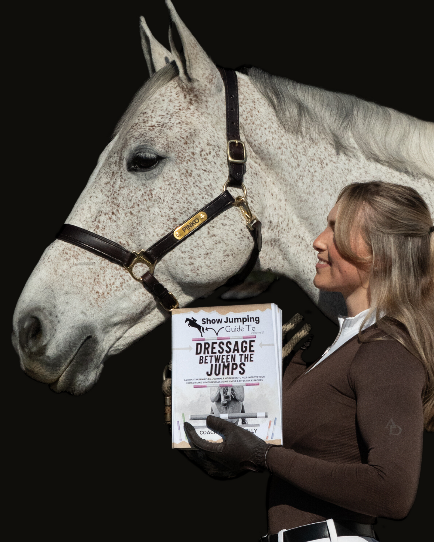 Rider Holding Show Jumping Guide to Dressage Between the Jumps Training Book